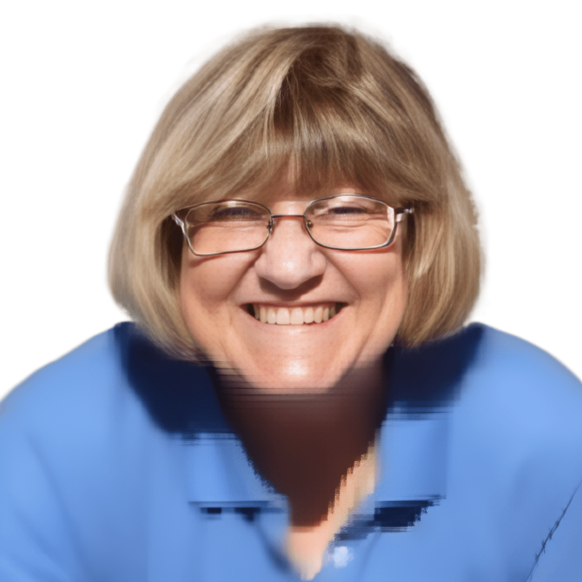 A woman, specializing in dog training, happily donning glasses and a blue shirt.